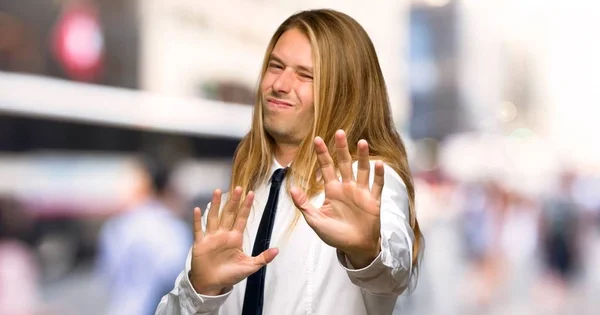 Blond Businessman Long Hair Little Bit Nervous Scared Stretching Hands — Stock Photo, Image