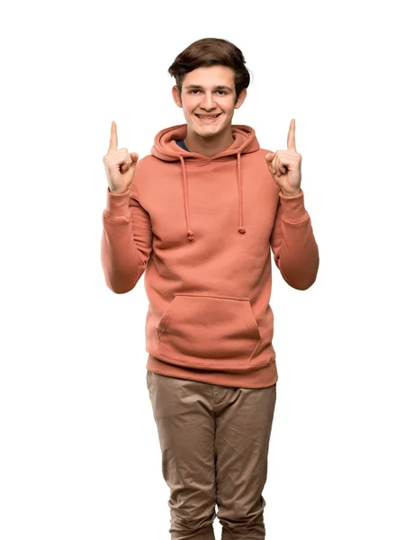 Teenager Mann Mit Sweatshirt Der Mit Dem Zeigefinger Auf Eine — Stockfoto