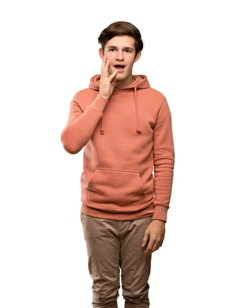 Teenager Mann Mit Sweatshirt Mit Überraschung Und Schockiertem Gesichtsausdruck Über — Stockfoto