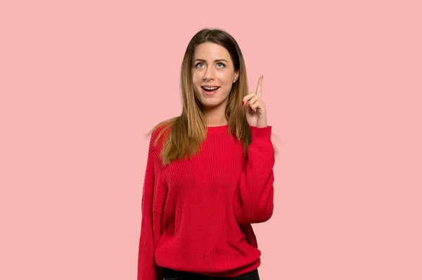 Young Woman Red Sweater Thinking Idea Pointing Finger Isolated Pink — Stock Photo, Image