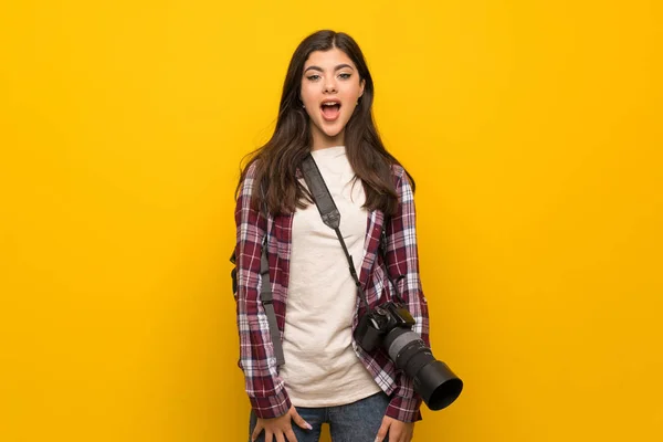 Photographer Teenager Girl Yellow Wall Surprise Facial Expression Stock Image