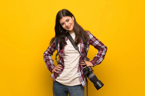 Photographer Teenager Girl Yellow Wall Posing Arms Hip Smiling Stock Picture
