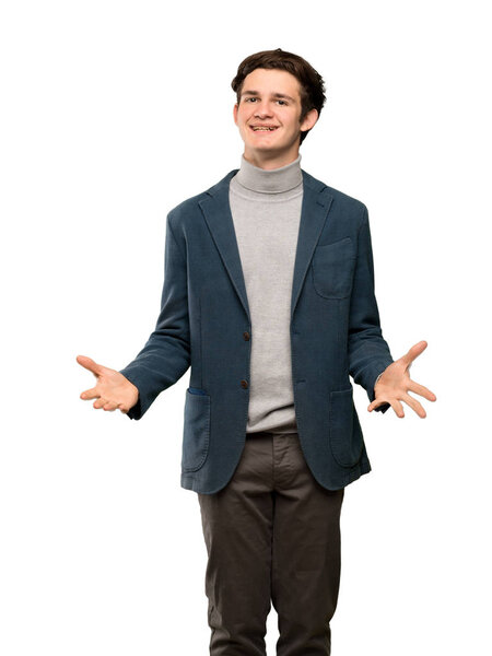 Teenager man with turtleneck smiling over isolated white background
