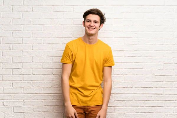 Teenager Man White Brick Wall Smiling — Stock Photo, Image
