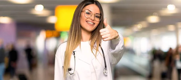 Young Doctor Woman Giving Thumbs Gesture Because Something Good Has — Stock Photo, Image