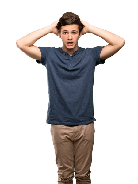 Adolescente Homem Frustrado Toma Mãos Cabeça Sobre Fundo Branco Isolado — Fotografia de Stock