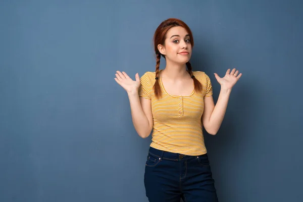 Young Redhead Woman Blue Background Making Unimportant Gesture While Lifting — Stock Photo, Image