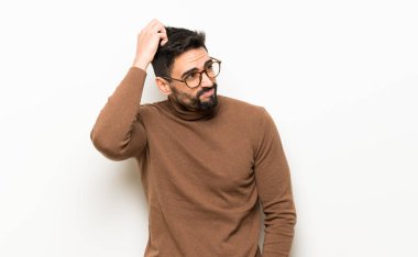 Sakallı yakışıklı bir adamın portresi.