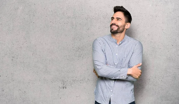 Elegant Man Shirt Looking While Smiling Textured Wall — Stock Photo, Image