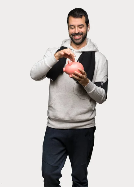 Homem Esporte Tomando Banco Porquinho Feliz Porque Está Cheio Sobre — Fotografia de Stock