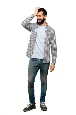 Sakallı yakışıklı adam bir şey ve çözüm izole beyaz arka plan üzerinde niyetinde gerçekleştirmiştir