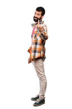 Esnaf adam gösterilen ve izole beyaz arka plan üzerinde parmak kaldırma