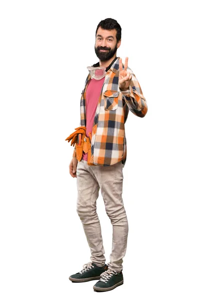 Artesãos Homem Sorrindo Mostrando Sinal Vitória Sobre Fundo Branco Isolado — Fotografia de Stock