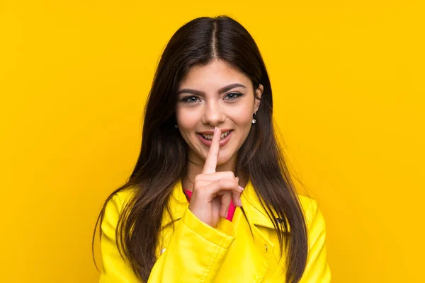 Teenager Girl Yellow Wall Doing Silence Gesture — Stock Photo, Image