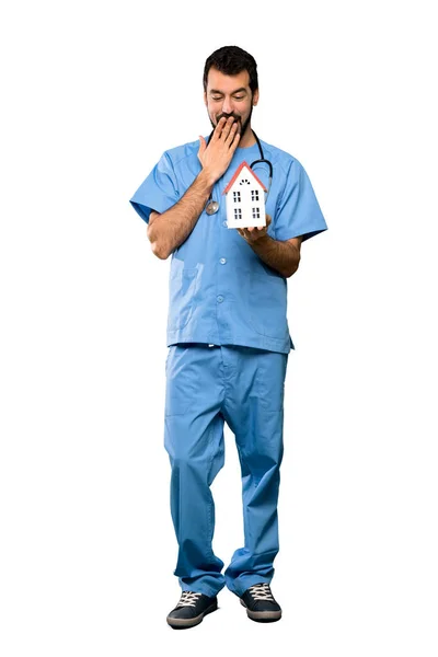 Chirurg dokter man met een huisje — Stockfoto