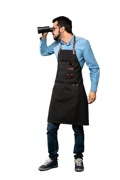 Homem com avental com binocular — Fotografia de Stock