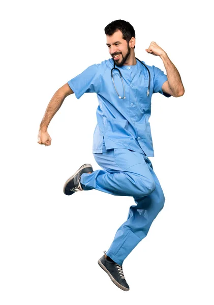 Surgeon doctor man jumping — Stock Photo, Image