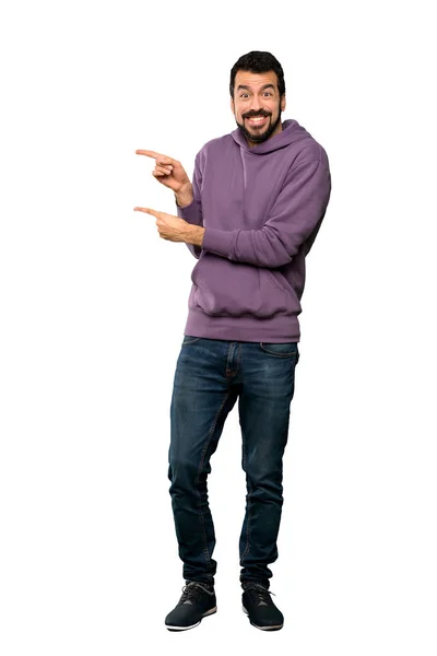 Full Length Shot Handsome Man Sweatshirt Frightened Pointing Side Isolated — Stock Photo, Image