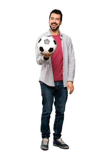 Красивий чоловік з бородою тримає футбольний м'яч — стокове фото