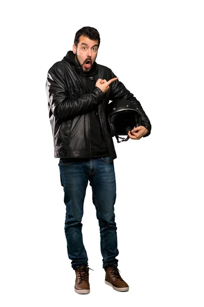 Full Length Shot Biker Man Surprised Pointing Side Isolated White — Stock Photo, Image