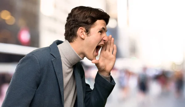 Teenager Man Turtleneck Shouting Mouth Wide Open Lateral Outdoors — Stock Photo, Image