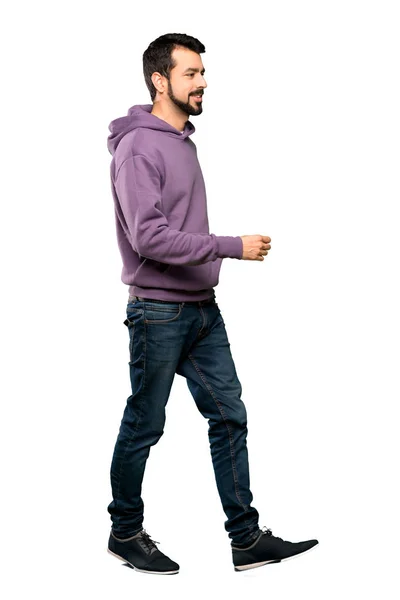 Handsome man with sweatshirt walking — Stock Photo, Image