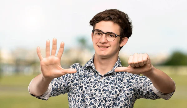 Teenager Man Flower Shirt Glasses Counting Six Fingers Outdoors — Stock Photo, Image