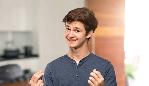 Teenager Man Making Money Gesture Indoors — Stock Photo, Image