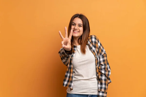 Young Woman Brown Wall Happy Counting Three Fingers — Stock Photo, Image