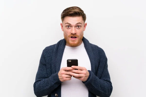 Redhead man with mobile — Stock Photo, Image