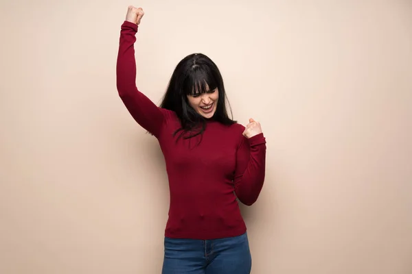 Young Woman Red Turtleneck Celebrating Victory — Stock Photo, Image