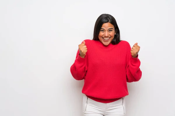 Young Colombian Girl Red Sweater Celebrating Victory Winner Position — 스톡 사진