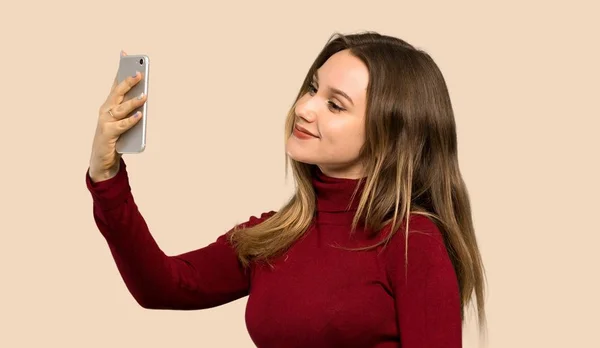 Teenager Girl Turtleneck Making Selfie Isolated Ocher Background — Stock Photo, Image