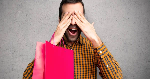 Man Shopping Bags Covering Eyes Hands Surprised See What Ahead — Stock Photo, Image