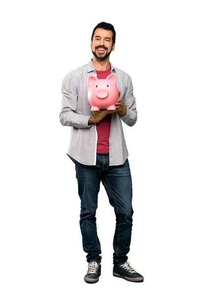 Tiro Completo Homem Bonito Com Barba Segurando Mealheiro Sobre Fundo — Fotografia de Stock