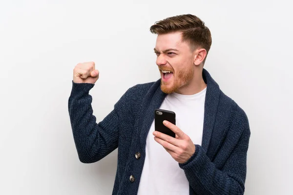 Redhead man with mobile — Stock Photo, Image