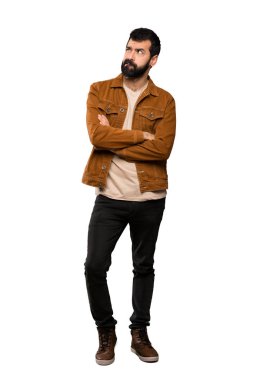 Sakal ile yakışıklı adam izole beyaz arka plan üzerinde yüz ifadesi karıştırır