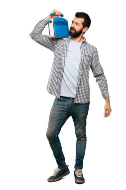 Bir radyo tutan sakallı yakışıklı adam