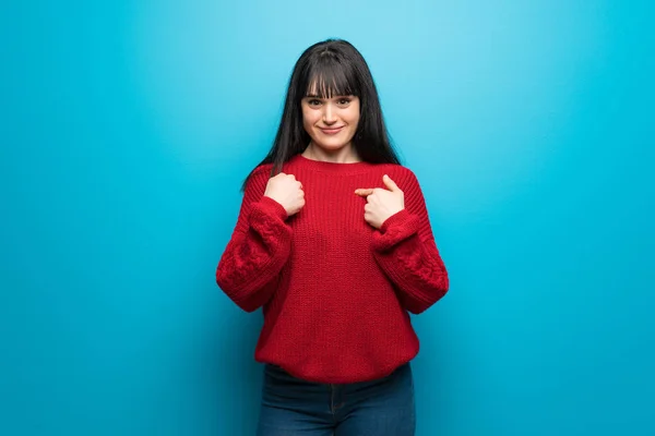 Woman Red Sweater Blue Wall Surprise Facial Expression — Stock Photo, Image