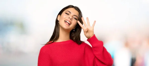 Teenager Mädchen Mit Rotem Pullover Glücklich Und Zählt Vier Mit — Stockfoto