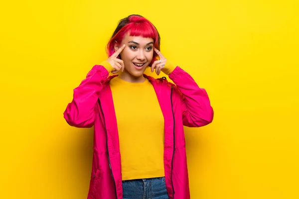 Young Woman Pink Hair Yellow Wall Having Doubts Thinking — 스톡 사진