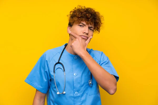 Surgeon doctor african american man standing and thinking an idea