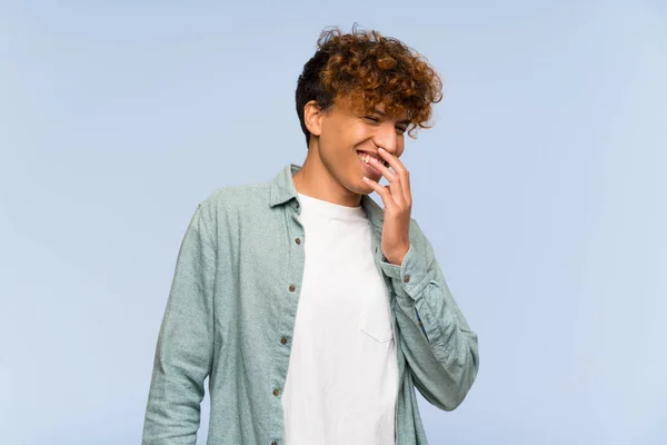 Young African American Man Isolated Blue Wall Smiling Lot — Stock Photo, Image