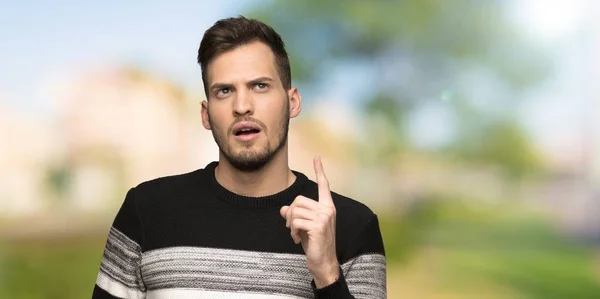 Handsome Man Thinking Idea Pointing Finger Outdoors — Stock Photo, Image