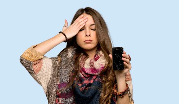 Young Hippie Woman Troubled Holding Broken Smartphone Isolated Blue Background — Stock Photo, Image