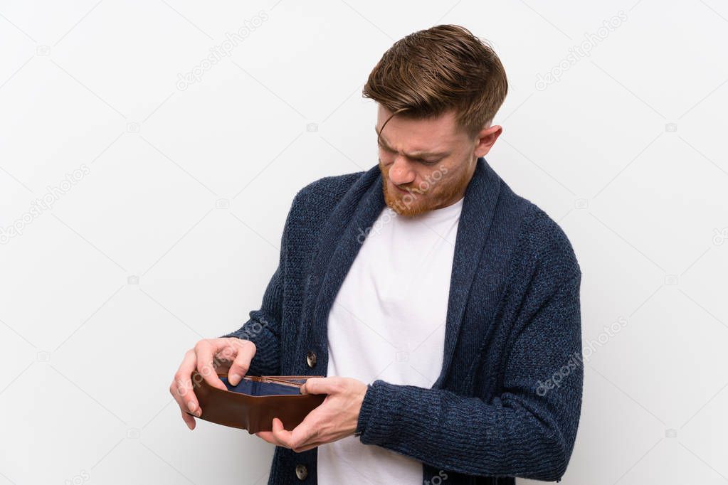 Redhead man holding a wallet