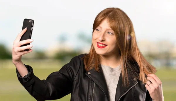 Young Redhead Woman Making Selfie Outdoors — Stock Photo, Image