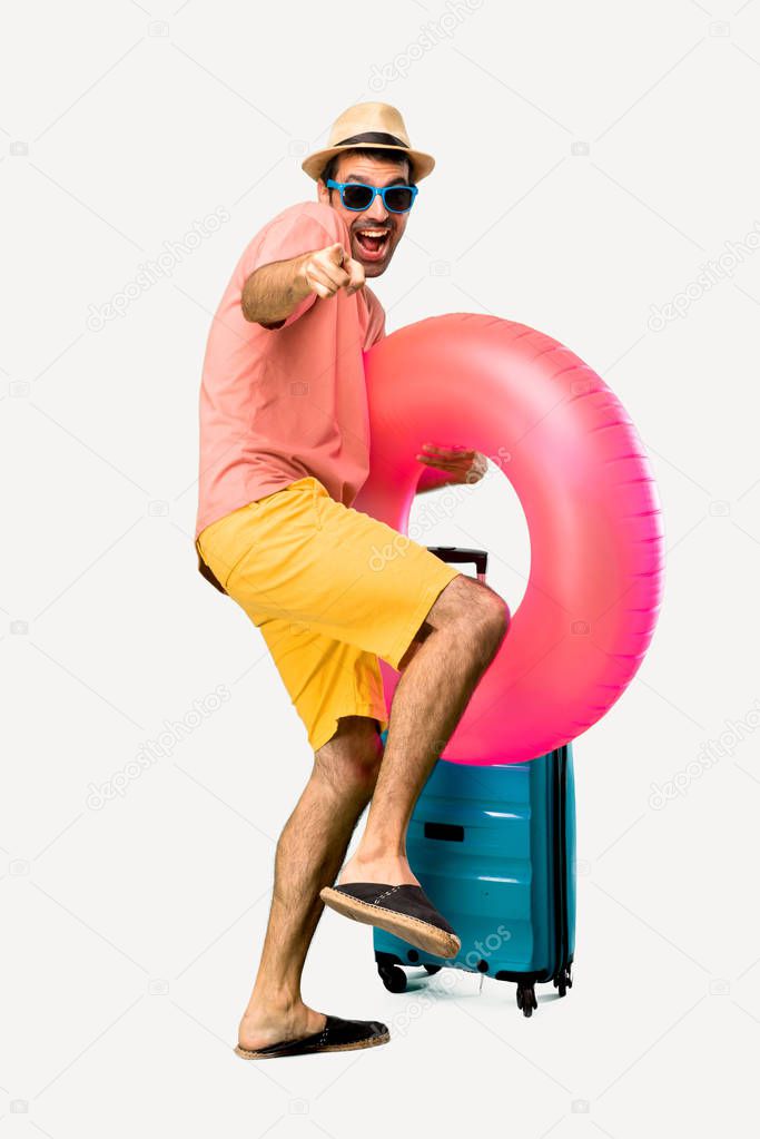 Full body of Man with hat and sunglasses on his summer vacation 