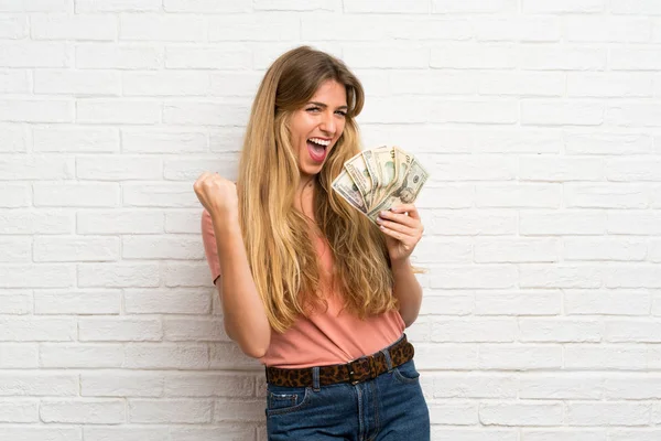 Young Blonde Woman White Brick Wall Taking Lot Money — Stock Photo, Image