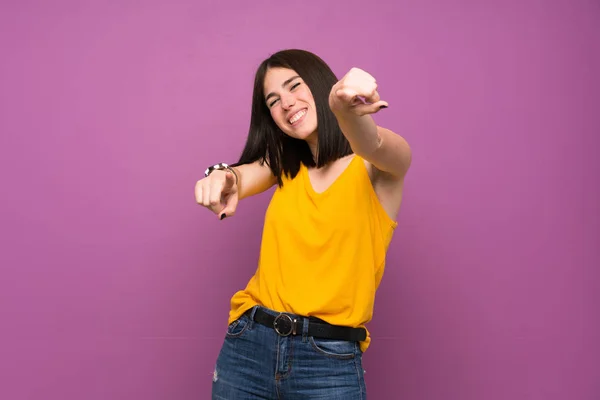 Young Woman Isolated Purple Wall Points Finger You While Smiling — Stock Photo, Image